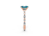 Rose gold Oval Cut Blue Topaz Solitaire with Side Stones on a Pavé Band and Four-Prong Setting_2