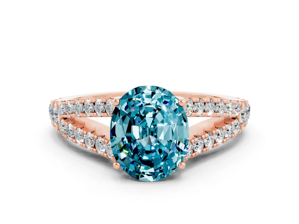 Rose gold Oval Cut Blue Topaz Split Shank Pavé Engagement Ring with Four-Prong Setting