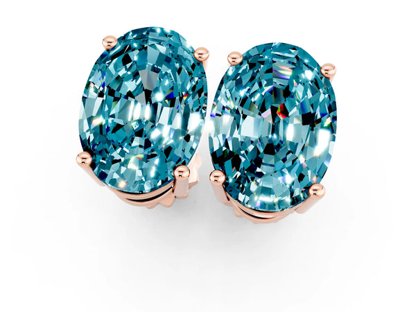 Rose gold Oval Cut Blue Topaz Stud Earrings
