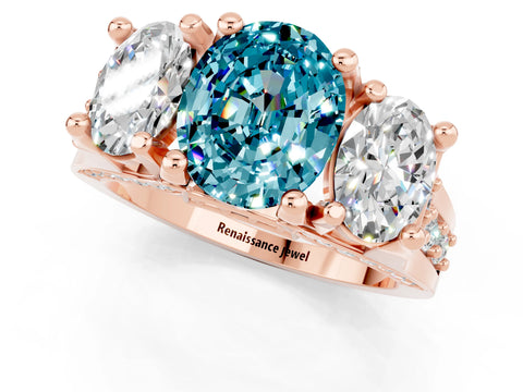 Rose gold Oval Cut Blue Topaz Three-Stone Ring with Channel Set Band and Four-Prong Setting_1