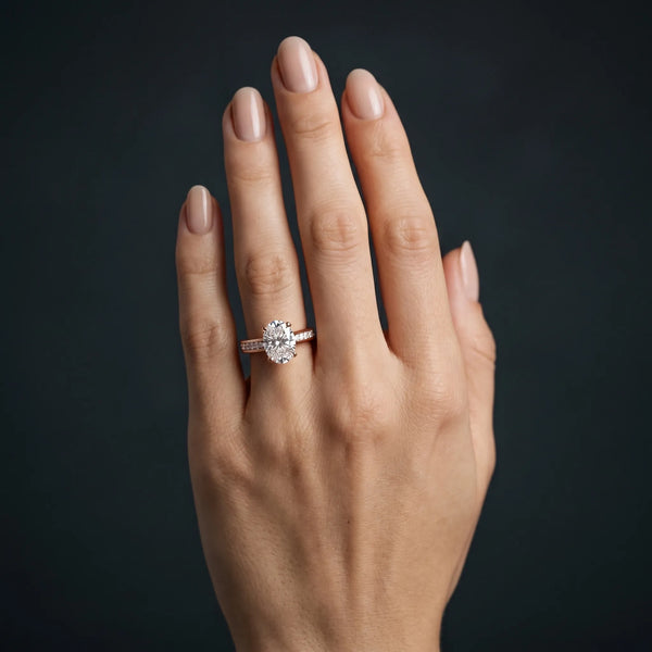 Rose gold Oval Cut Channel Set Solitaire Engagement Ring with Prong Setting