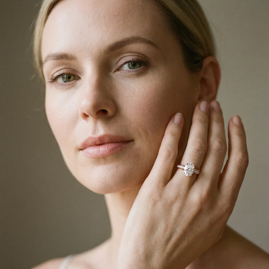 Rose gold Oval Cut Channel Set Solitaire Engagement Ring with Prong Setting