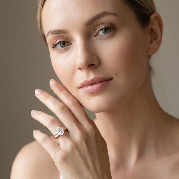 Rose gold Oval Cut Channel Set Solitaire Ring with Four-Prong Setting