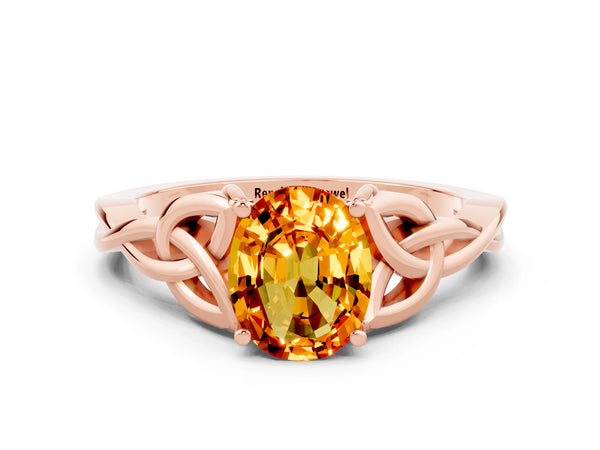 Rose gold Oval Cut Citrine Solitaire Engagement Ring with Celtic Knot Band and Four-Prong Setting