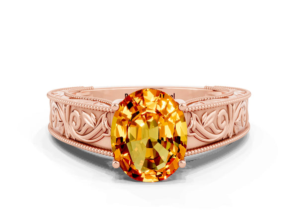 Rose gold Oval Cut Citrine Solitaire Ring with Engraved Band and Four-Prong Setting