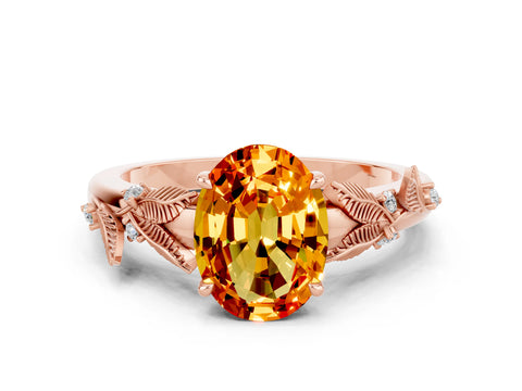 Rose gold Oval Cut Citrine Solitaire Ring with Leaf Motif Band and Four-Prong Setting