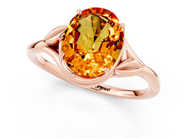 Rose gold Oval Cut Citrine Solitaire Ring with Twist Band and Four-Prong Setting