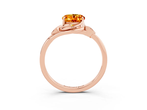 Rose gold Oval Cut Citrine Solitaire Ring with Twist Band and Four-Prong Setting