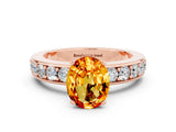 Rose gold Oval Cut Cut Channel Set Diamond Engagement Ring with Four-Prong Setting