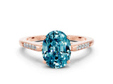 Rose gold Oval Cut Cut Channel Set Solitaire Engagement Ring with Four-Prong Setting