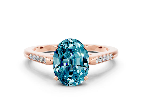 Rose gold Oval Cut Blue Topaz Solitaire Ring with Channel Set Round Band and Prong Setting