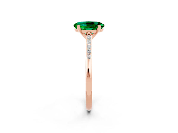 Rose gold Oval Cut Emerald Solitaire Ring with Channel Set Round Band and Prong Setting