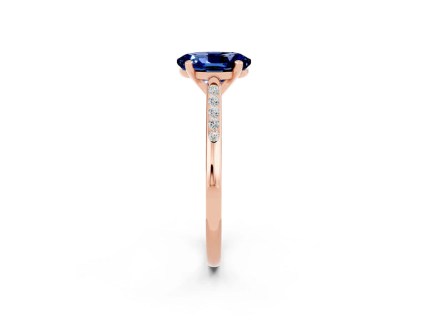 Rose gold Oval Cut Blue Sapphire Solitaire Ring with Channel Set Round Band and Prong Setting