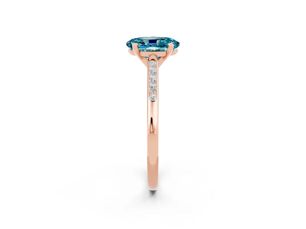 Rose gold Oval Cut Blue Topaz Solitaire Ring with Channel Set Round Band and Prong Setting