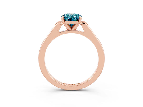 Rose gold Oval Cut Blue Topaz Solitaire Ring with Channel Set Round Band and Prong Setting