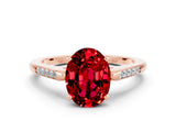 Rose gold Oval Cut Cut Channel Set Solitaire Engagement Ring with Four-Prong Setting