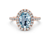 Rose gold Oval Cut Cut Diamond Floral Halo Engagement Ring with Pavé Band and Prong Setting