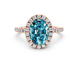 Rose gold Oval Cut Cut Diamond Floral Halo Engagement Ring with Pavé Band and Prong Setting