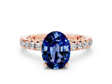 Rose gold Oval Cut Cut Diamond Pavé Band with Four-Prong Setting