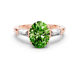 Rose gold Oval Cut Cut Diamond Ring with Tapered Baguette Side Stones in Four-Prong Setting