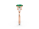 Rose gold Oval Cut Cut Diamond Ring with Tapered Baguette Side Stones in Four-Prong Setting_2