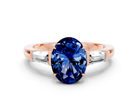 Rose gold Oval Cut Cut Diamond Ring with Tapered Baguette Side Stones in Four-Prong Setting
