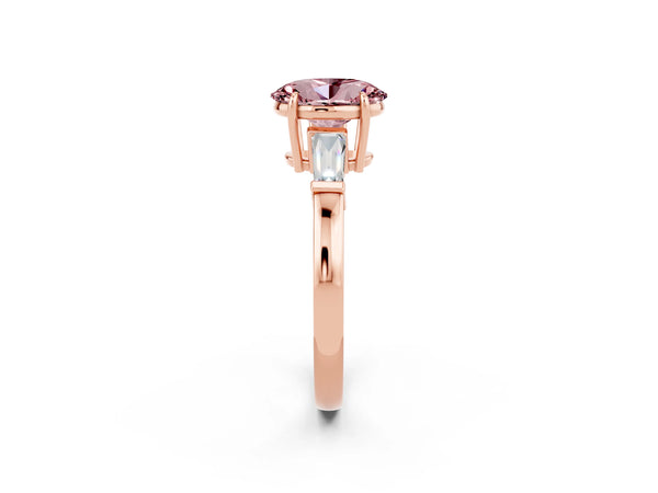 Rose gold Oval Cut Cut Diamond Ring with Tapered Baguette Side Stones in Four-Prong Setting