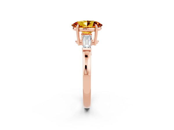 Rose gold Oval Cut Citrine Three-Stone Ring with Tapered Baguette Side Stones and Prong Setting