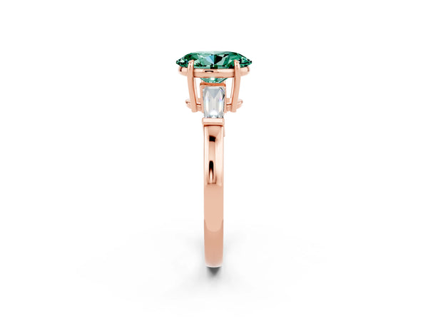 Rose gold Oval Cut Green Sapphire Three-Stone Ring with Tapered Baguette Side Stones and Prong Setting