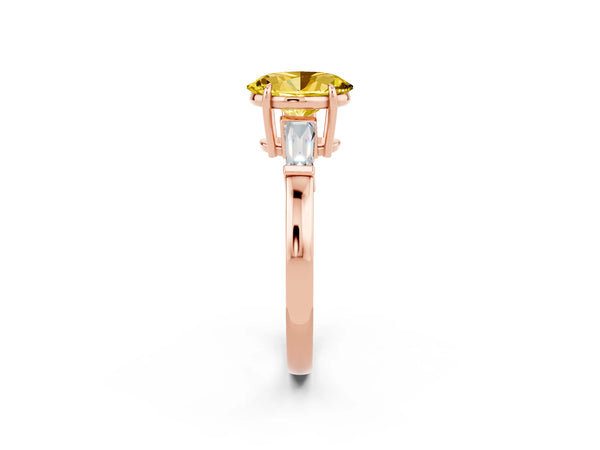 Rose gold Oval Cut Yellow Sapphire Three-Stone Ring with Tapered Baguette Side Stones and Prong Setting
