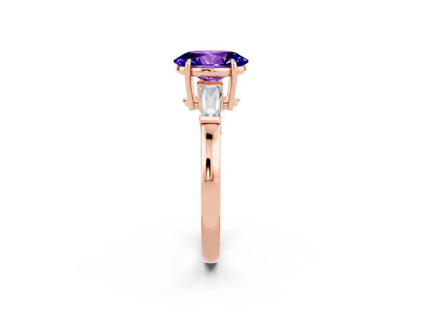 Rose gold Oval Cut Tanzanite Three-Stone Ring with Tapered Baguette Side Stones and Prong Setting