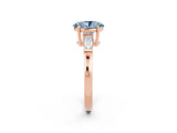 Rose gold Oval Cut Cut Diamond Ring with Tapered Baguette Side Stones in Four-Prong Setting_2