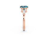 Rose gold Oval Cut Cut Diamond Ring with Tapered Baguette Side Stones in Four-Prong Setting_2