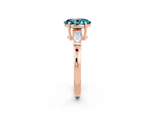 Rose gold Oval Cut Cut Diamond Ring with Tapered Baguette Side Stones in Four-Prong Setting