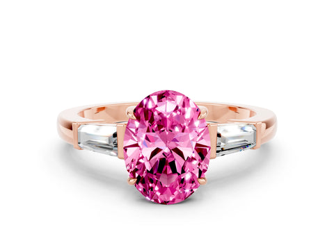 Rose gold Oval Cut Cut Diamond Ring with Tapered Baguette Side Stones in Four-Prong Setting