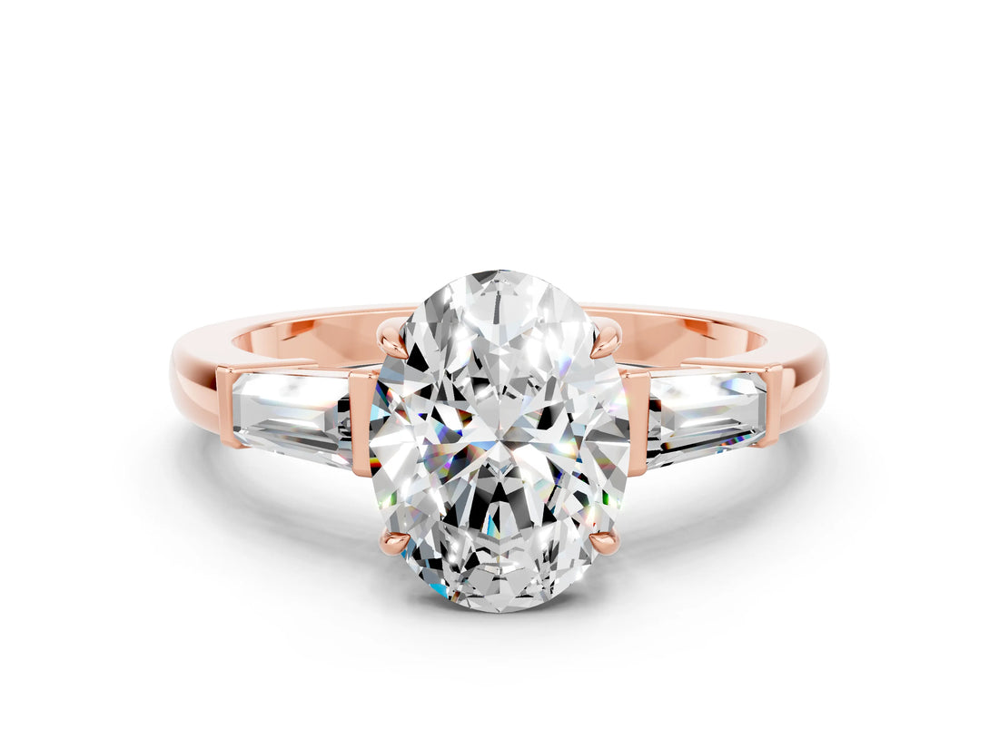 Rose gold Oval Cut Cut Diamond Ring with Tapered Baguette Side Stones in Four-Prong Setting