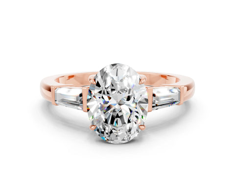 Rose gold Oval Cut Cut Diamond Ring with Tapered Baguette Side Stones in Four-Prong Setting
