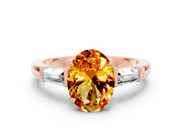 Rose gold Oval Cut Citrine Three-Stone Ring with Tapered Baguette Side Stones and Prong Setting
