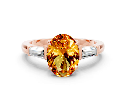 Rose gold Oval Cut Cut Diamond Ring with Tapered Baguette Side Stones in Four-Prong Setting
