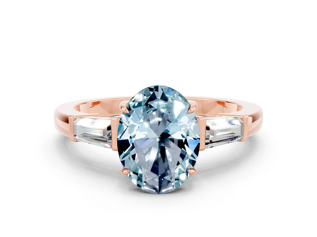 Rose gold Oval Cut Cut Diamond Ring with Tapered Baguette Side Stones in Four-Prong Setting