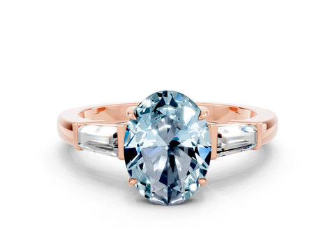 Rose gold Oval Cut Cut Diamond Ring with Tapered Baguette Side Stones in Four-Prong Setting