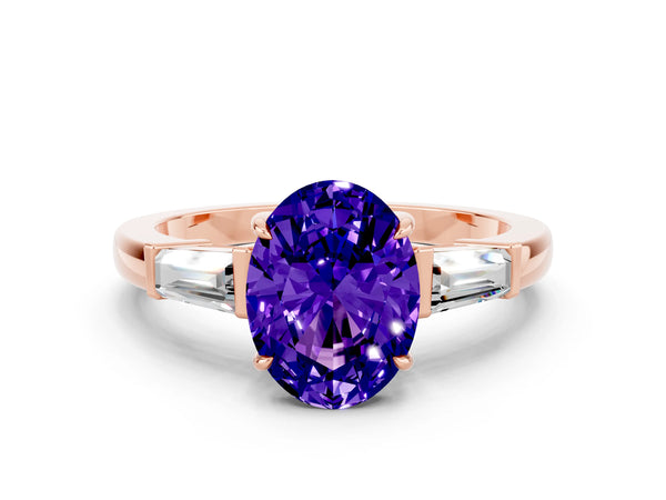 Rose gold Oval Cut Tanzanite Three-Stone Ring with Tapered Baguette Side Stones and Prong Setting