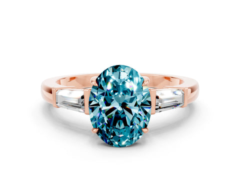 Rose gold Oval Cut Cut Diamond Ring with Tapered Baguette Side Stones in Four-Prong Setting
