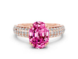 Rose gold Oval Cut Cut Pave Diamond Engagement Ring with Channel Set Band and Four-Prong Setting