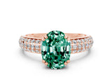 Rose gold Oval Cut Cut Pave Diamond Engagement Ring with Channel Set Band and Four-Prong Setting