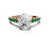 Rose gold Oval Cut Diamond Cathedral Solitaire Ring with Round with Emerald side stone Pavé Band