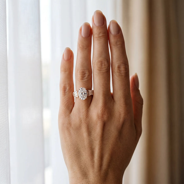 Rose gold Oval Cut Diamond Engagement Ring with Baguette Side Stones and Channel Set Band