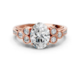 Rose gold Oval Cut Diamond Engagement Ring with Bezel Set Round Side Stones and Prong Setting_60