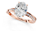 Rose gold Oval Cut Diamond Engagement Ring with Side Stone Accents and Four-Prong Setting_62