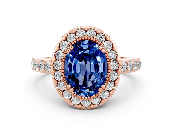 Rose gold Oval Cut Blue Sapphire Halo Ring with Pavé Band and Prong Setting